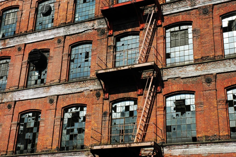 red brick building with a fire escape attached