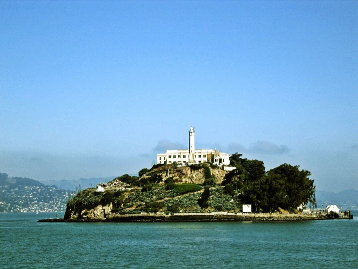 a small island with a light house on it