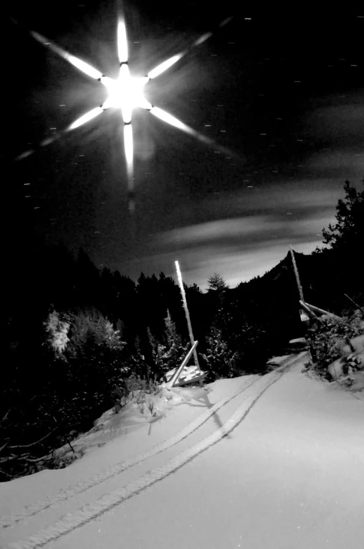 a person skiing on a hill in the night