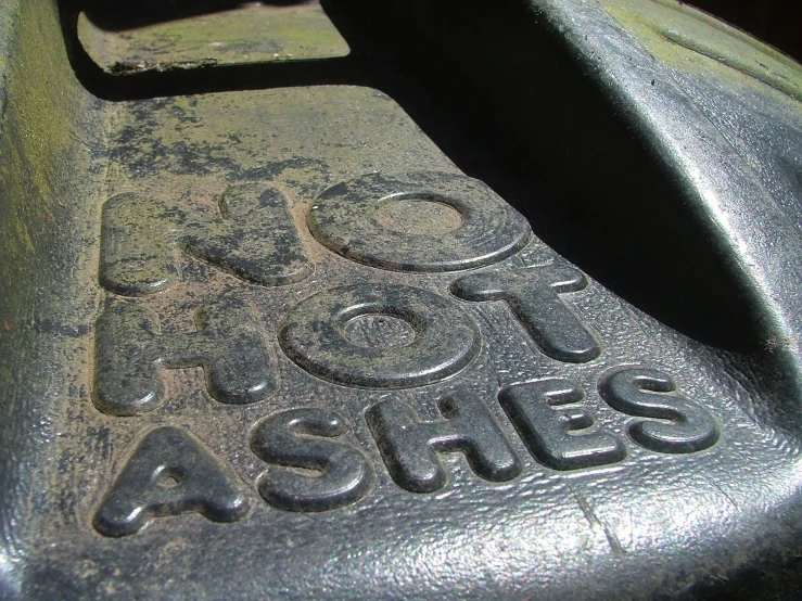 there is an old sign and the letters are old