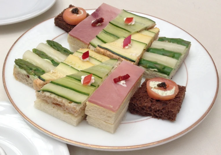 a plate with some assorted food items on it