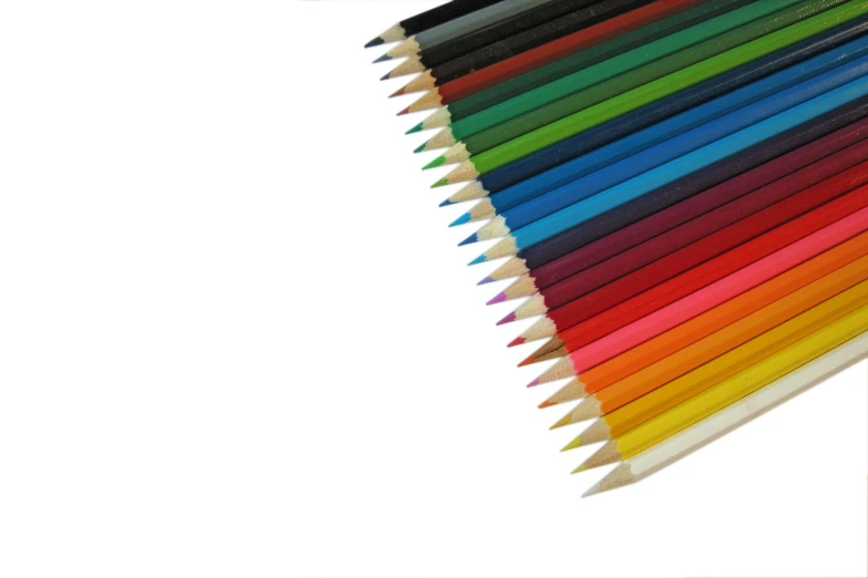 a set of colored pencils next to each other