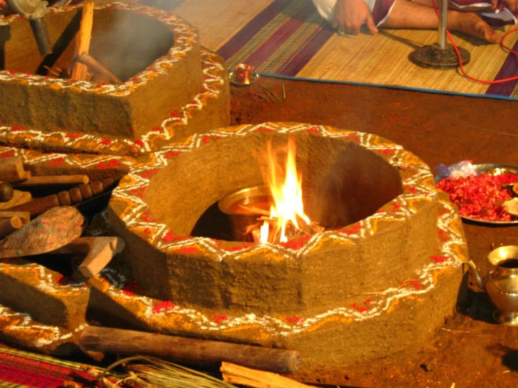 a fire pit in the middle of a room