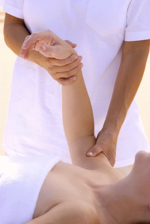 a man getting a massage from his hands