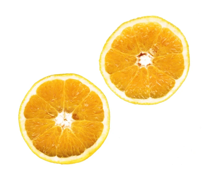 the two halves of oranges are cut into pieces