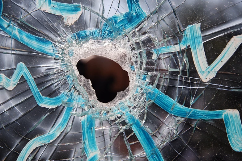 the inside of a broken glass object is shown