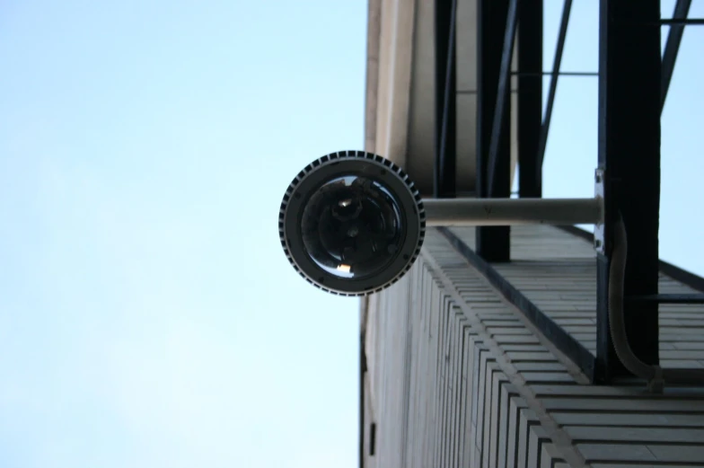 a security camera on a building wall