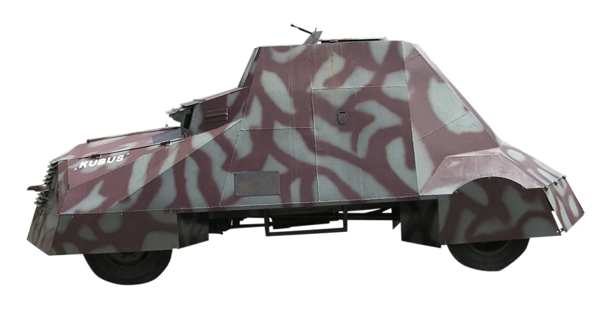 a large armored vehicle has ze stripes painted on it