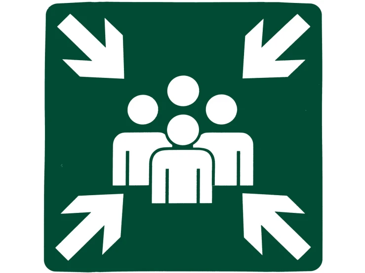two people standing at the bottom of a sign