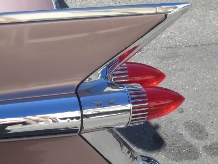 there is a close up s of the tail fins on a classic car