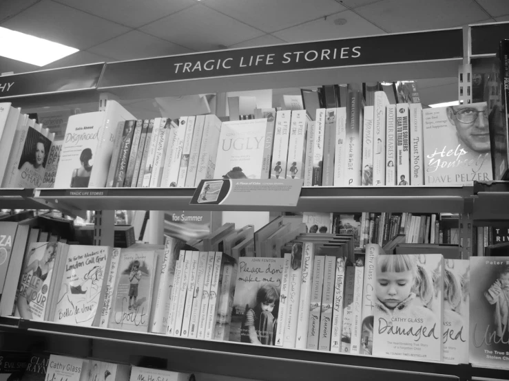 a book shop filled with books next to an empty store front