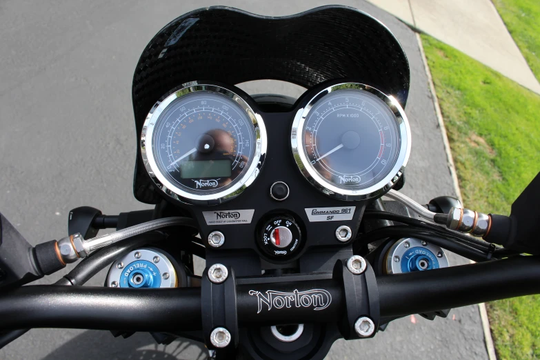 gauges on the handle bar of a motorcycle