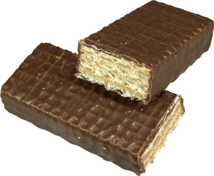 two pieces of chocolate peanut er bar stacked on each other