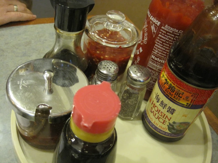 various spices sitting on top of a white saucer