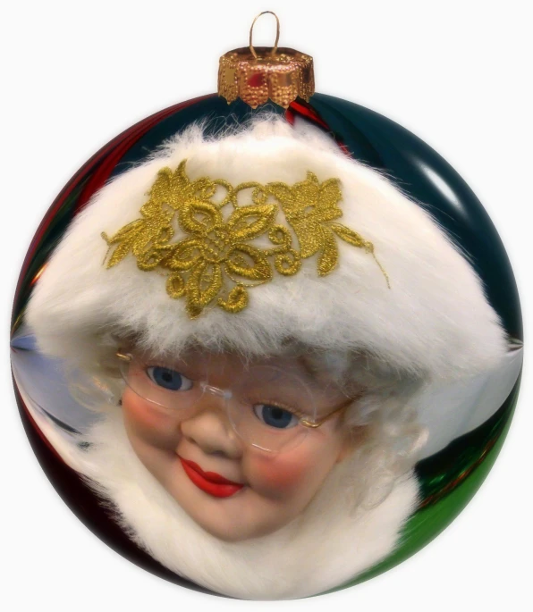 a round ornament depicting an image of a smiling girl with glasses