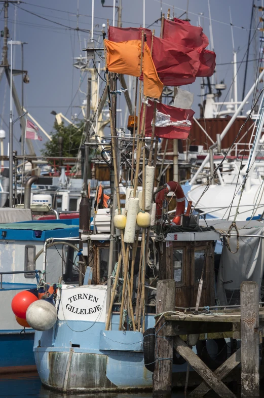 a boat is docked at a pier