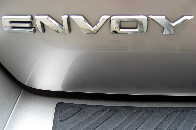 the name envy on the hood of a chevrolet vehicle