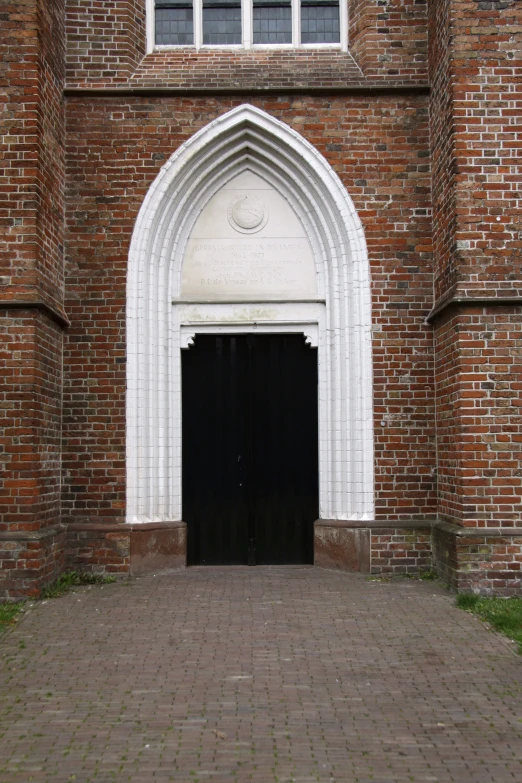 there is a door that is on the outside of this church