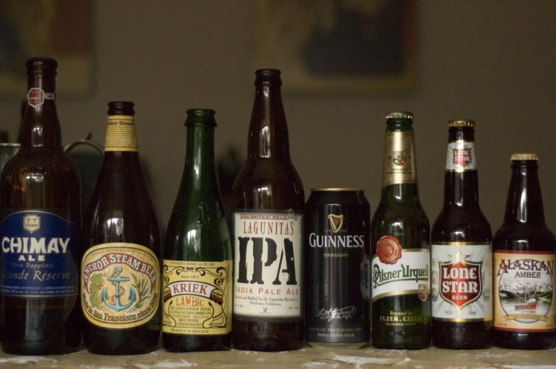 a collection of bottles sitting on top of a counter