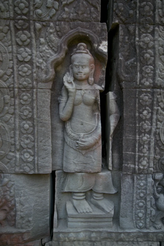 statue of a person inside of an ancient building