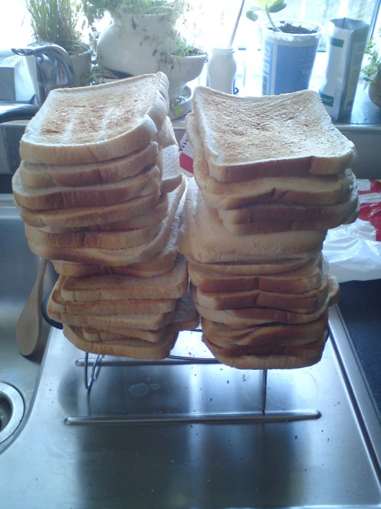 some pieces of bread are stacked on a metal tray