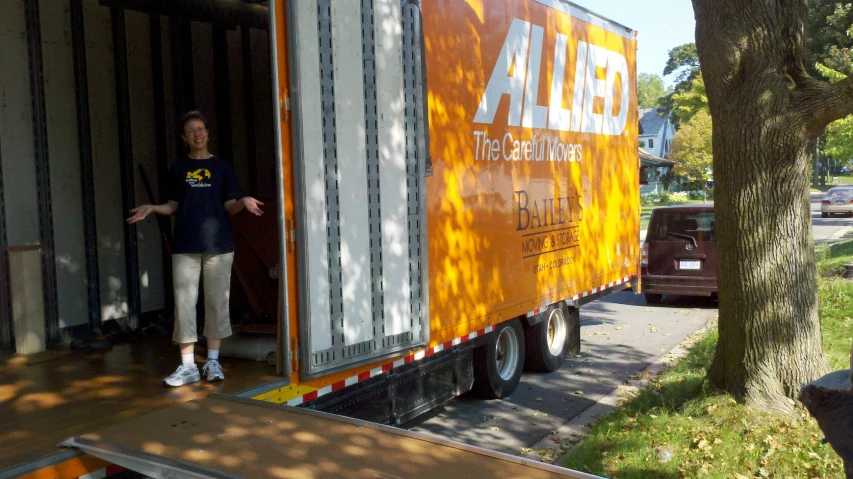 an image of a truck driver looking in the door