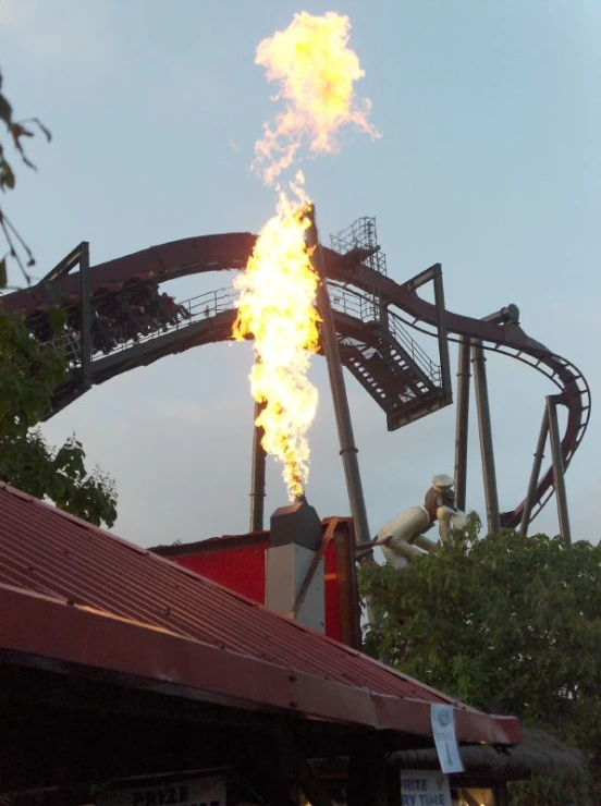 a lit up roller coaster at the park