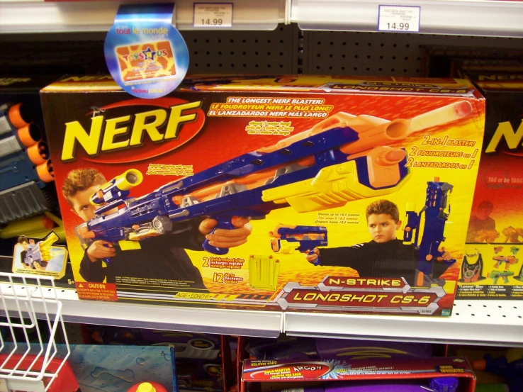 a bunch of nerf toys are on display