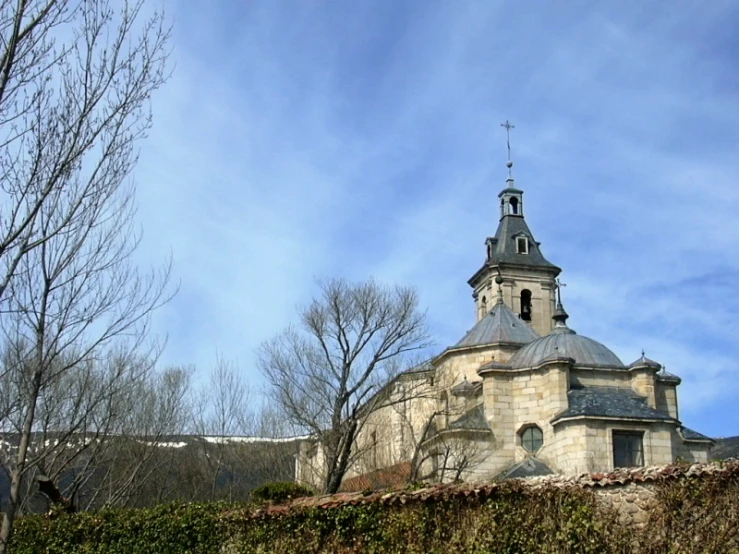 an old building with a steeple on top