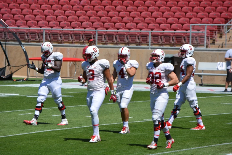 a group of football players on the field