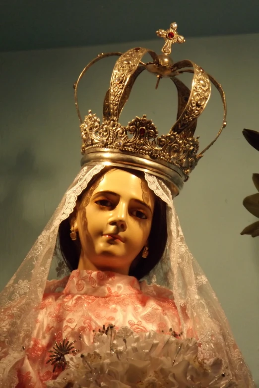 there is a head sculpture wearing a wedding crown