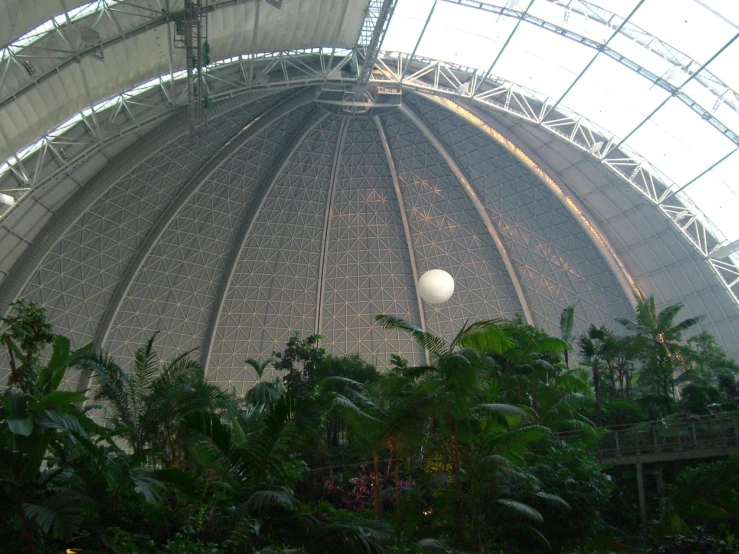 large domed structure with vegetation in the foreground