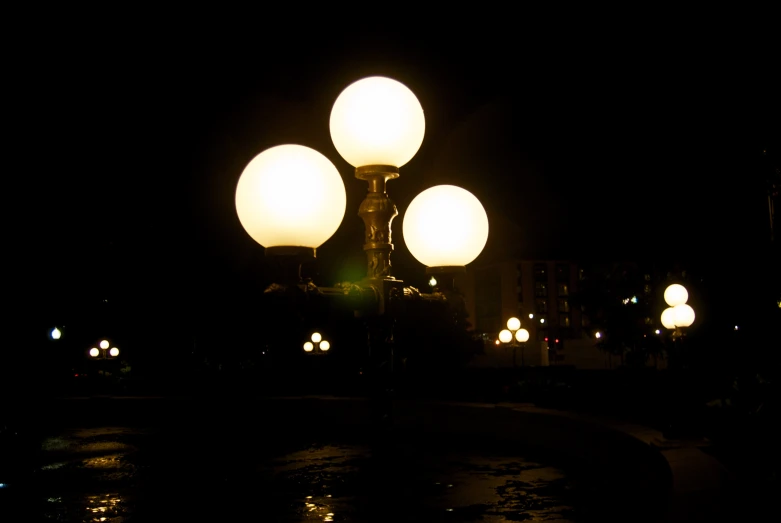 the streetlights are lit up and bright at night