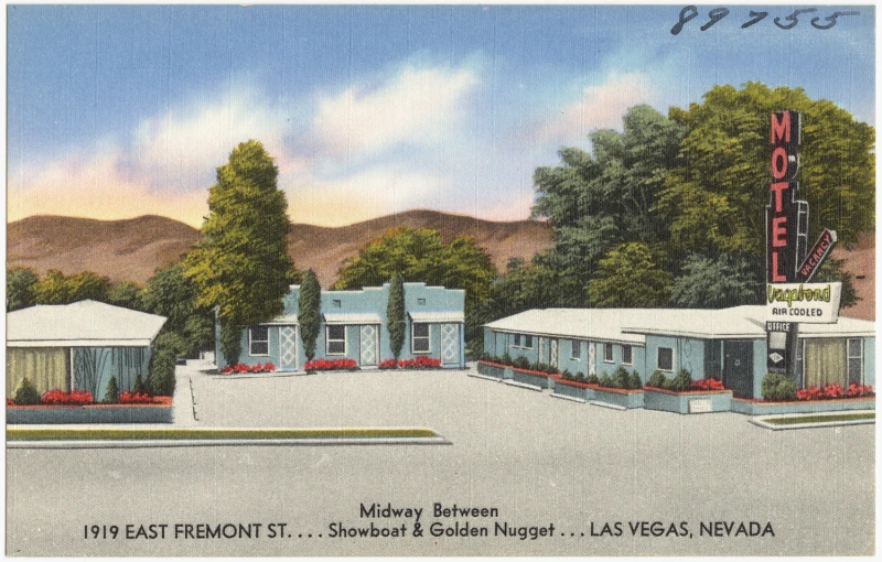 an old po of motels in the middle of the road