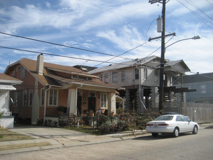 a car is parked in front of a house