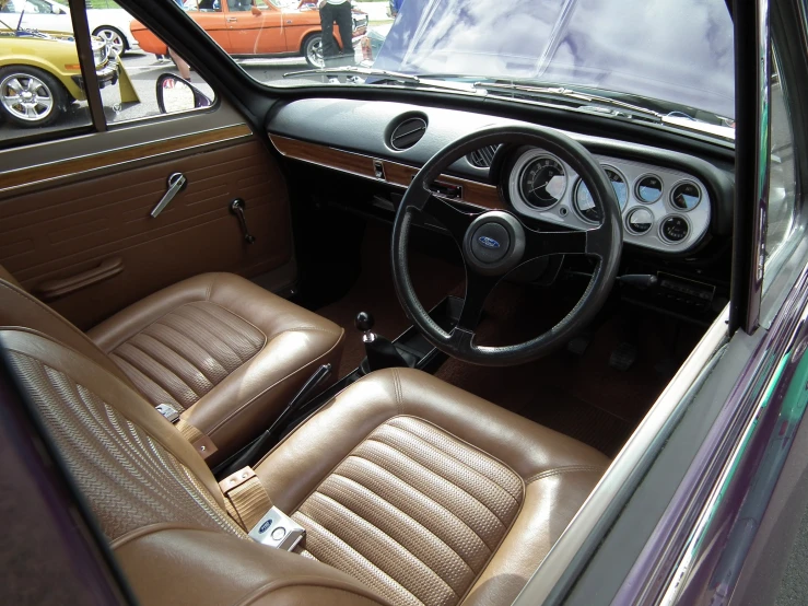 a brown and tan interior in a brown convertible
