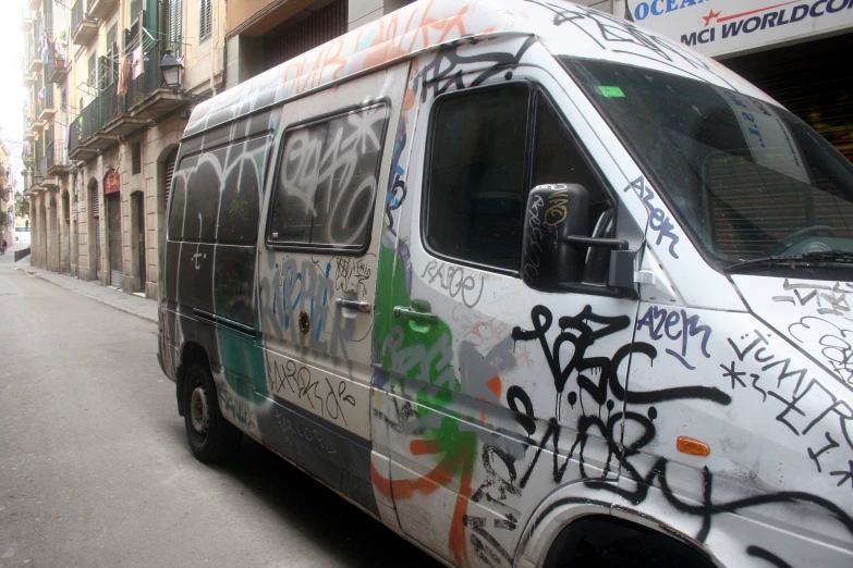 an image of a bus with graffiti on it