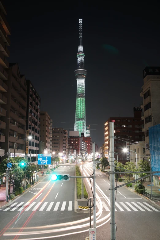 an aerial view of an urban street at night