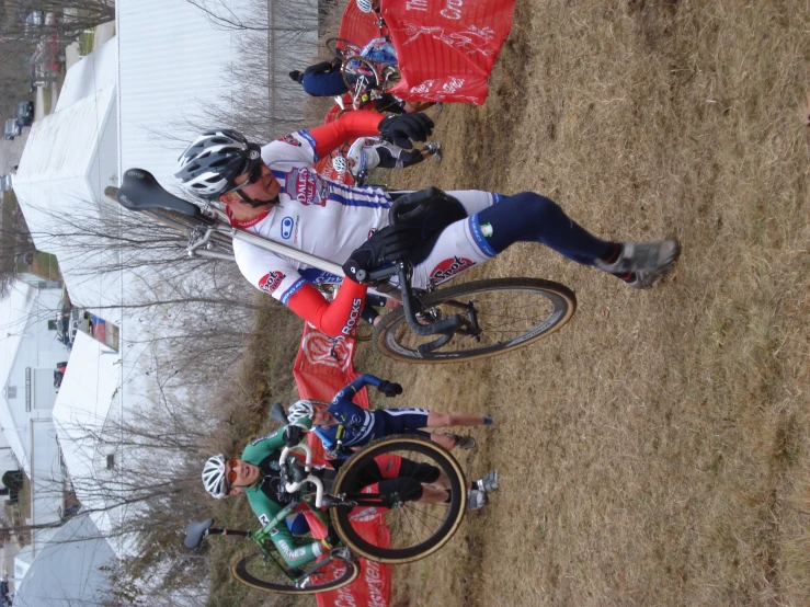 an adult and a child on bikes on the dirt