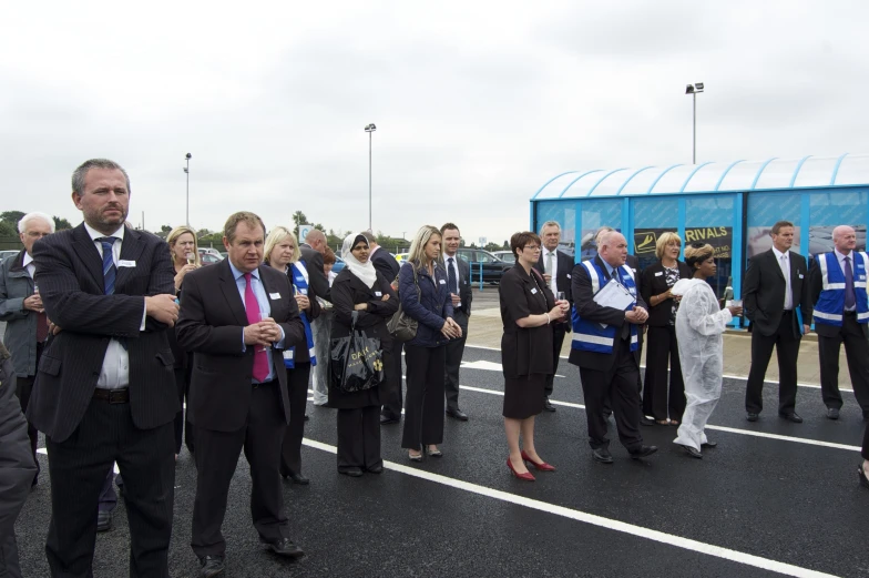 a group of people are lined up together for an event