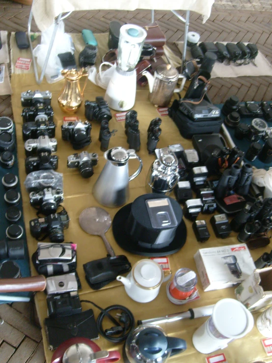 an outdoor market has many different types and types of cameras