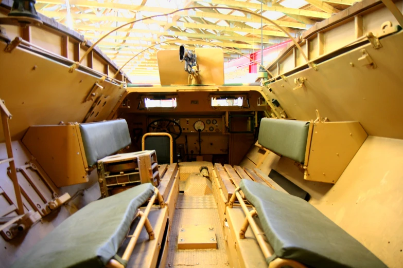 there are four chairs in the military vehicle