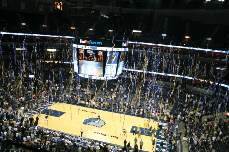 the court in a basketball arena where people are lined up