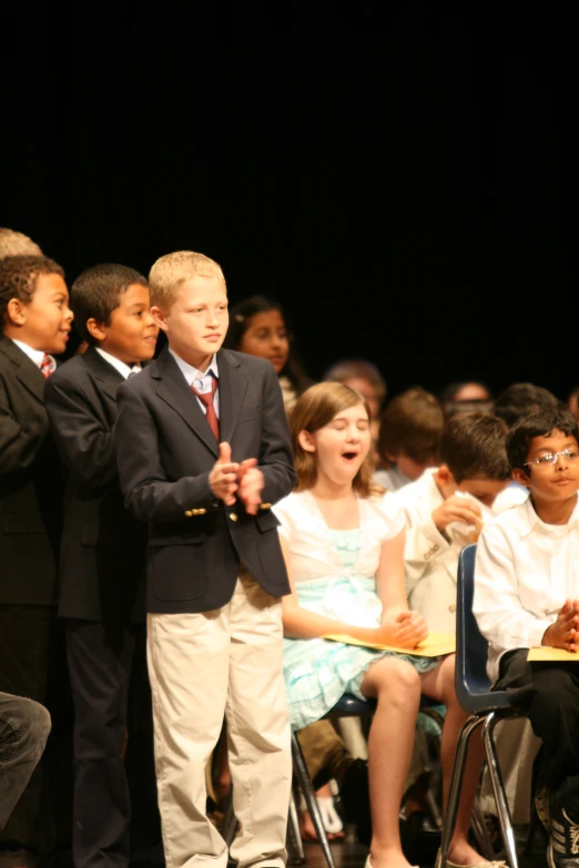 a number of s in small groups on stage