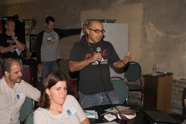 several people around a table in a room