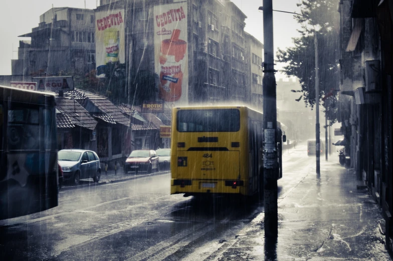 a bus on a city street in the rain