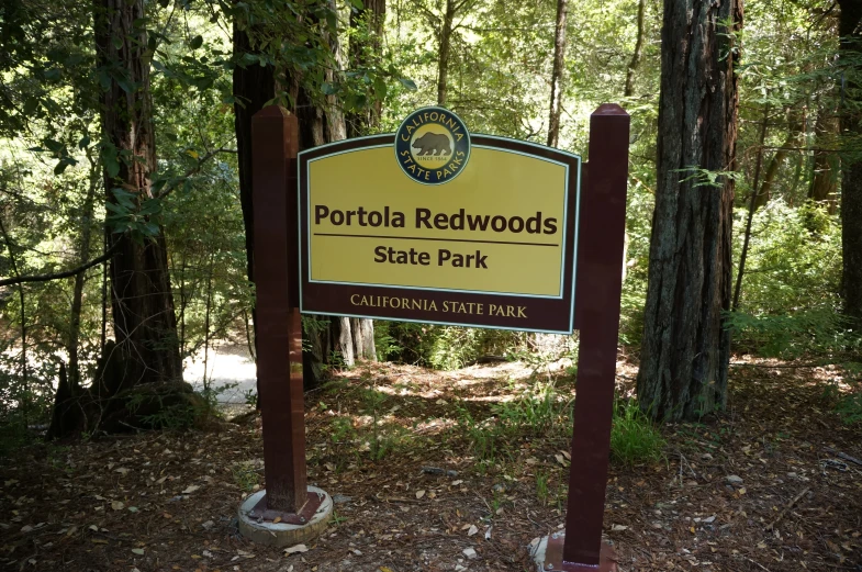 there is a sign that says porthole redwoods state park