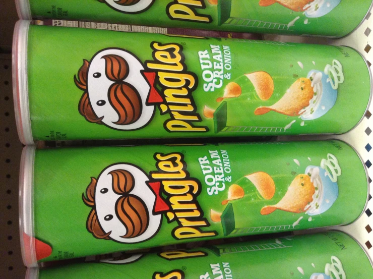 four pringles are shown on the shelf of the store