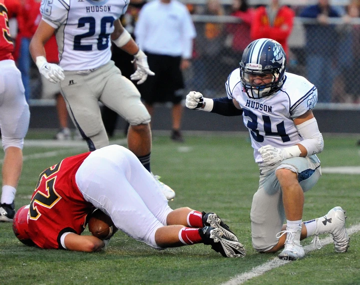 the football player is playing on the field