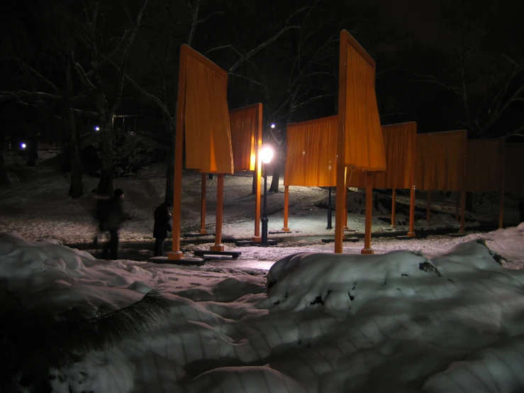 a po of a lighted park with snow